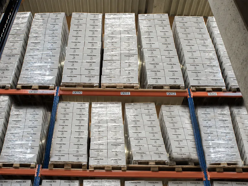Pallets of cartons in the high-bay racking